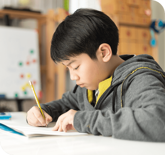 boy-with-glasses-studied-put-book-his-head-classroom